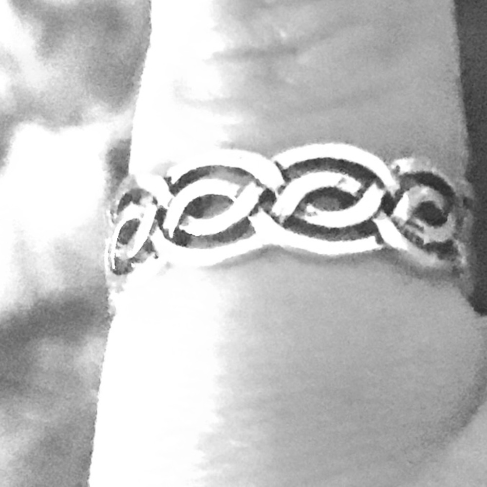 A silver pinky ring or it could go on your toe